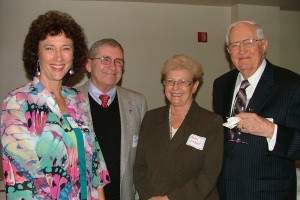 Two women and two men posing for a picture